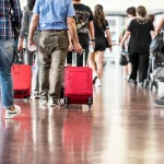 Travelers-in-Airport-901609744_1256x838